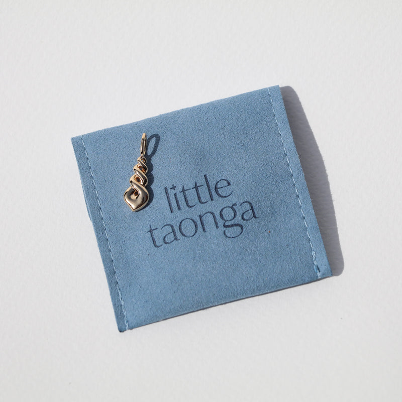 Triple Twist Charm
