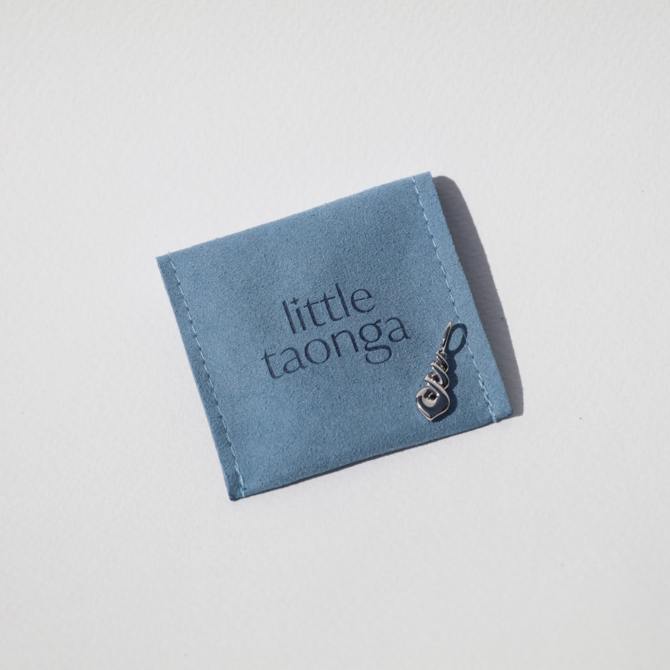 Triple Twist Charm