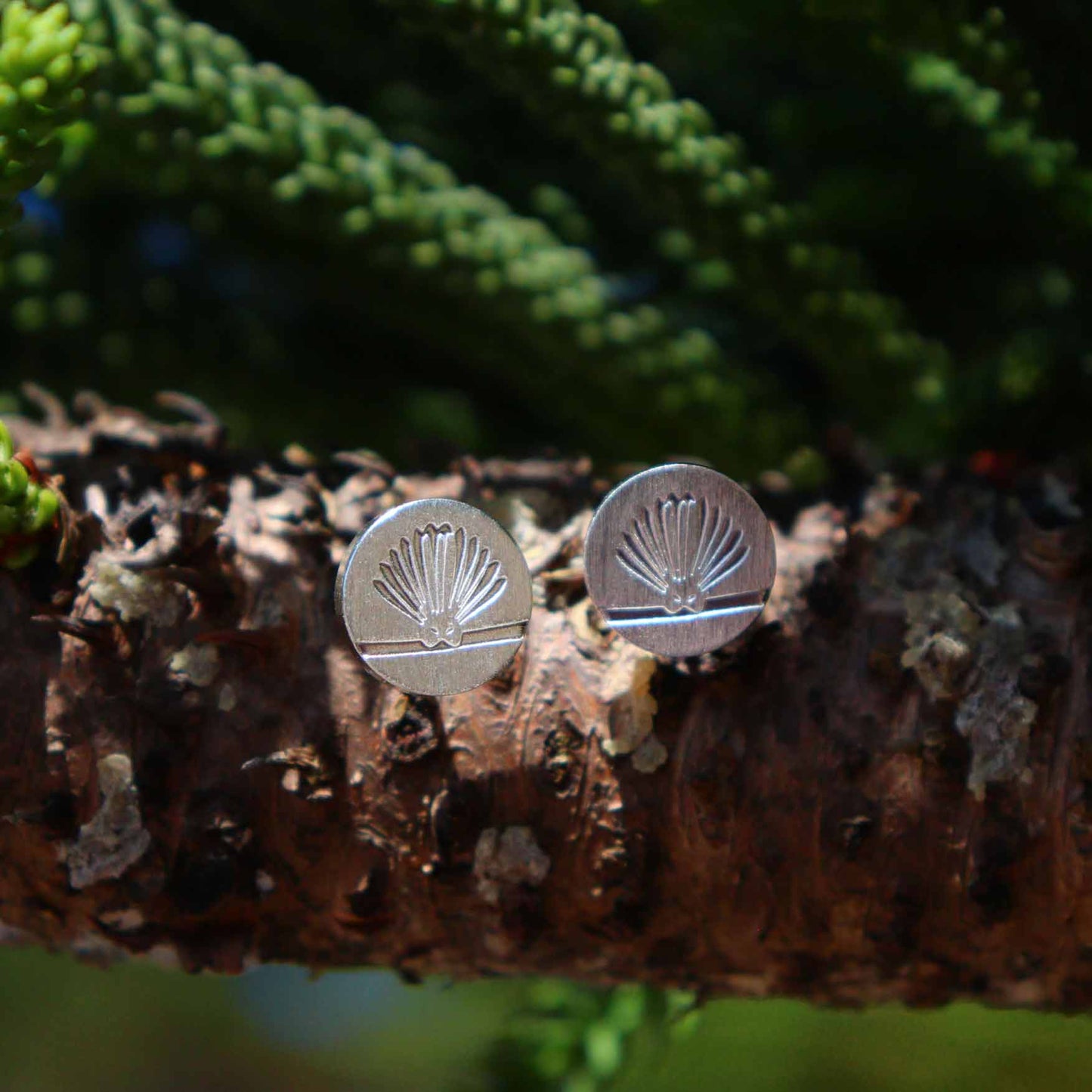 Playful Piwakawaka Silver Earrings