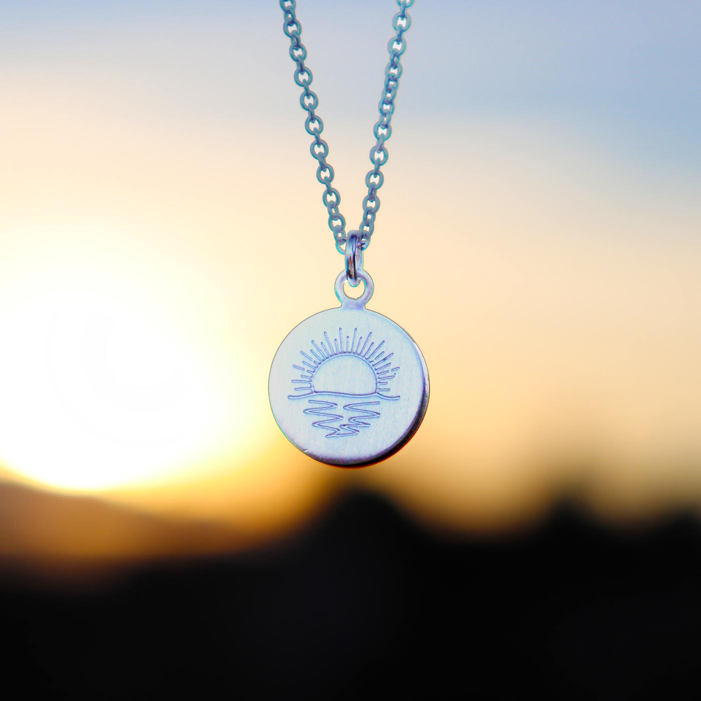 Keke Silver Ocean Rā sunrise sunset mountain etched silver necklace NZ jewellery