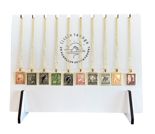 Little Taonga Stamp Necklace stand